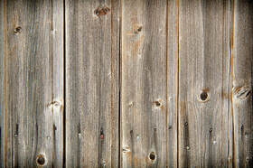 Sample picture of pressure-treated fence planks.