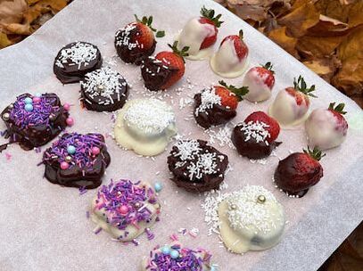 Tray of assorted desserts including chocolate covered strawberries in Raymerville-Markville East, Markham, Ontario